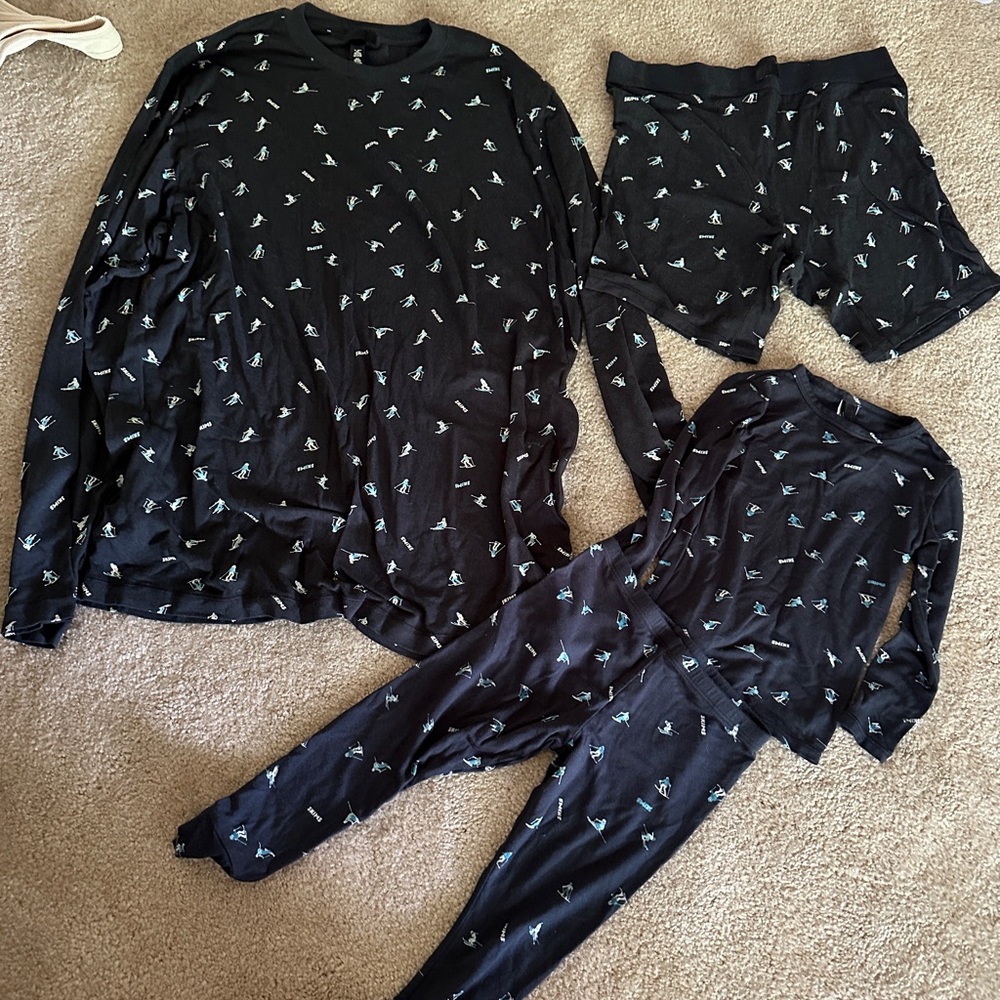 SKIMS Kids Black Pajama Set with Playful Print